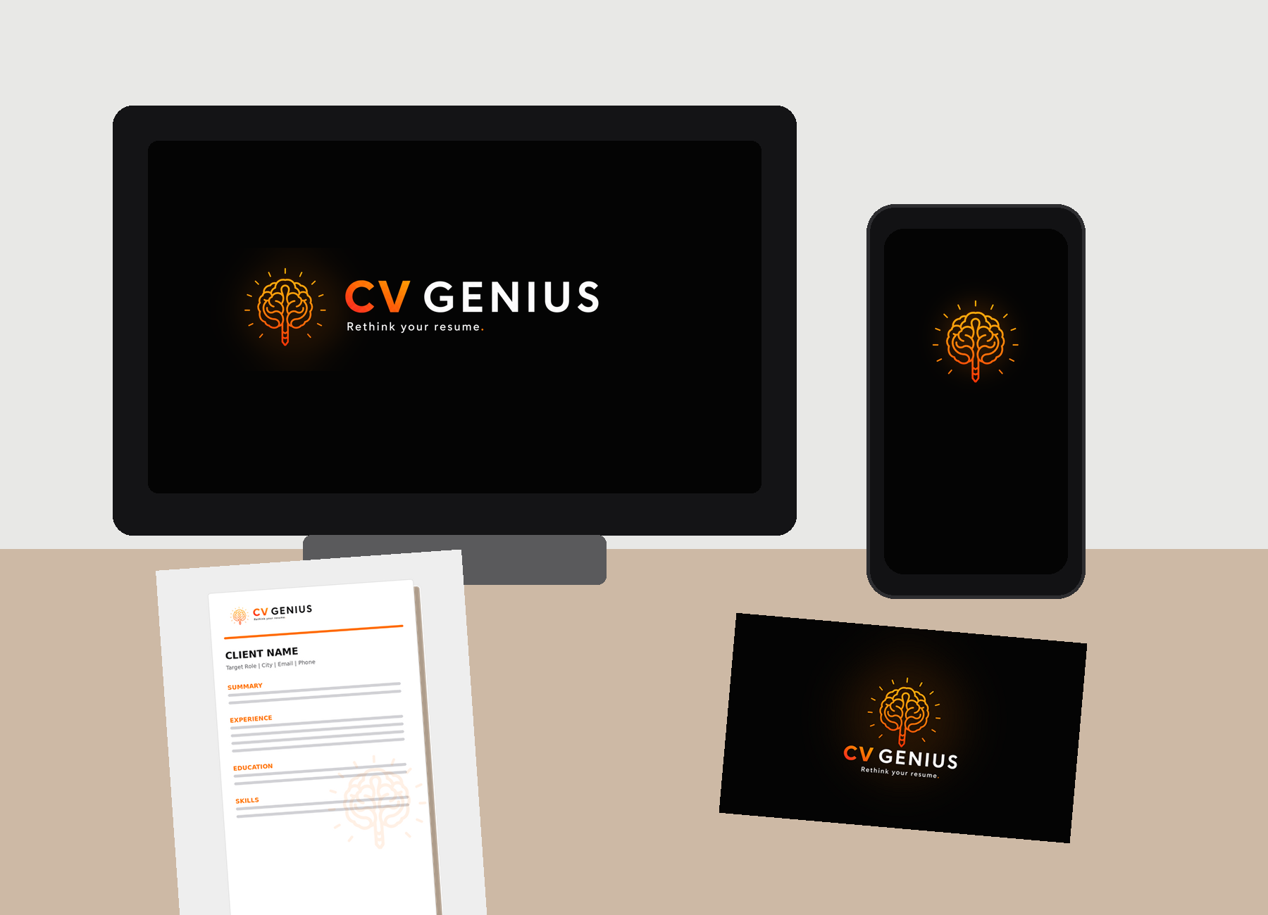 CV Genius branded desk setup with resume, laptop, phone and business card
